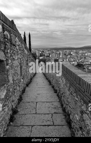 Girona, Catalonia, Spain - FEB 12, 2022: Ancient city walls of Girona, one of the most complete city walls in Europe. Stock Photo