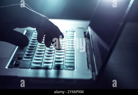 Man working on a laptop computer. Stock Photo