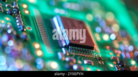 Close-up of a computer chip on a circuit board. Stock Photo