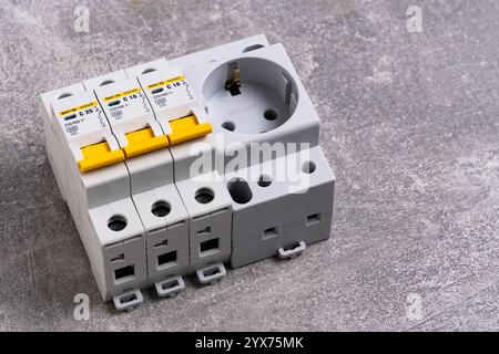 Electrical fuse box with socket on gray background, closeup Stock Photo