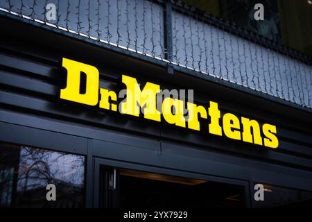 Berlin, Germany - December 2024: Dr. Martens logo sign store on facade building Stock Photo
