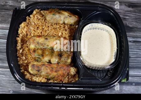 Shrimp Kofta made of shrimps, herbs, parsley, flour, cumin, salt, pepper, onion and garlic, grilled or baked, served with Tahini and red fish rice, se Stock Photo