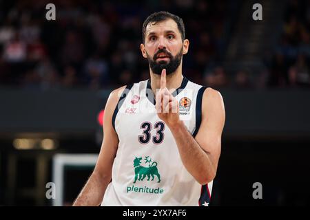 Barcelona, Spain. 14th Dec, 2024. Nikola Mirotic of EA7 Emporio Armani Milan during the Turkish Airlines Euroleague match, date 15 between FC Barcelona and EA7 Emporio Armani Milan played at Palau Blaugrana Stadium on December 14, 2024 in Barcelona, Spain. (Photo by Judit Cartiel/PRESSINPHOTO) Credit: PRESSINPHOTO SPORTS AGENCY/Alamy Live News Stock Photo