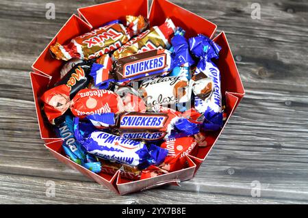 Cairo, Egypt, November 24 2024: Celebrations box mini chocolate bars, assorted chocolates of Mini-bars of Mars, Snicker, Malteser, Bounty, Twix, Milky Stock Photo