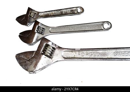 Different sizes of adjustable wrenches, hand tools include wrenches, pliers, cutters, files, striking tools, struck or hammered tools, screwdrivers, v Stock Photo