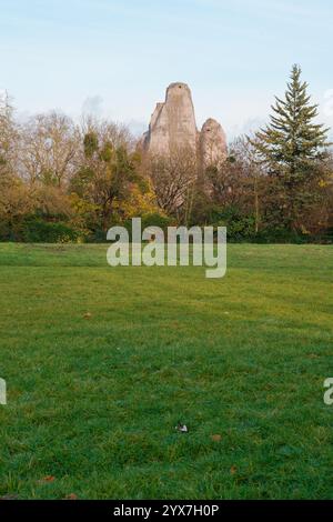 Visit Bois de Vincennes in Paris for a serene experience surrounded by nature and unique rock formations on a clear day Stock Photo