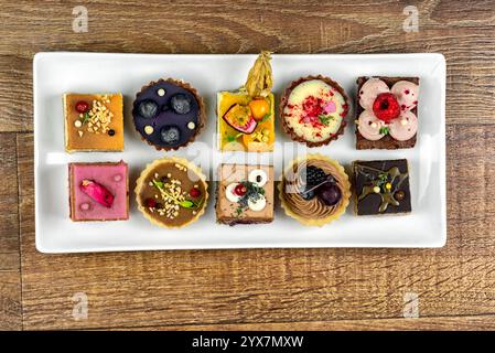 Many various cakes on white plate Stock Photo