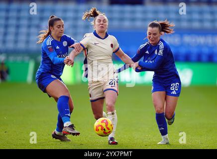 Chelsea's Niamh Charles (centre) is challenged by Leicester City's Missy Goodwin (right) and Julie Thibaud during the Barclays Women's Super League match at the King Power Stadium, Leicester. Picture date: Saturday December 14, 2024. Stock Photo