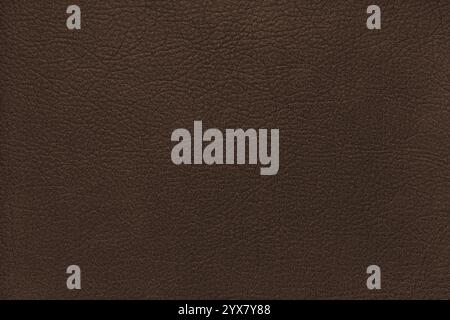 Natural, genuine solid brown leather texture close up, macro. Structure of matte leatherette, artifical skin surface with embossing pattern. Backgroun Stock Photo