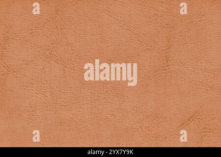 Natural, genuine orange leather texture close up, macro. Structure of matte leatherette, artifical skin surface with embossing pattern. Background, wa Stock Photo