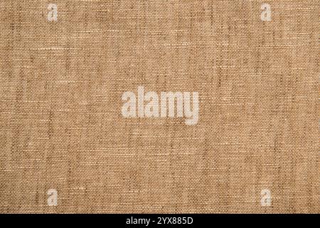Beige linen fabric texture closeup as textile background Stock Photo