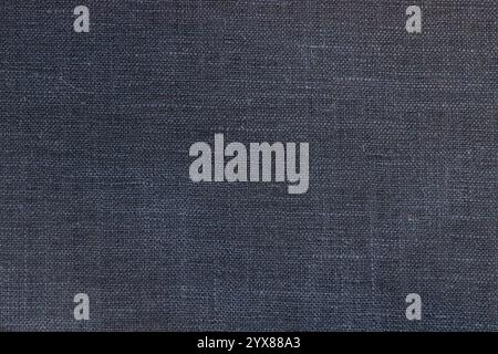 Dark navy color linen fabric texture closeup as textile background Stock Photo
