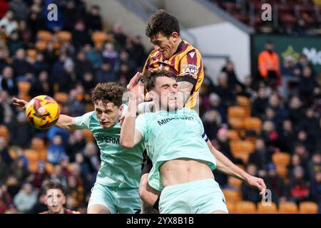 Bradford, UK. 14th Dec, 2024. Valley Parade, Bradford, England, December 14th 2024: Andy Cook (9 Bradford City) heads the ball during the EFL Sky Bet League Two match between Bradford City and Swindon Town at Valley Parade in Bradford, England on December 14th 2024. (Sean Chandler/SPP) Credit: SPP Sport Press Photo. /Alamy Live News Stock Photo