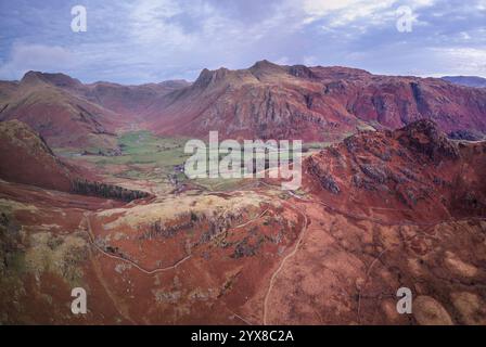 Beautiful atmospheric aerial drone Autumn landscape image of Langdale Pikes in Lake District Stock Photo