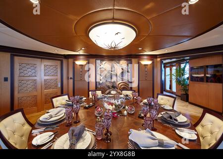 Elegant Dining Room with Ornate Decor and Sophisticated Table Setting Stock Photo