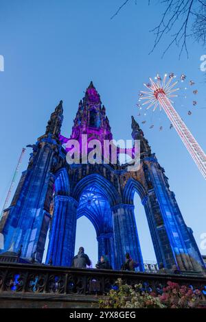Fairground ride star flyer and Scott monument at Edinburgh Christmas ...