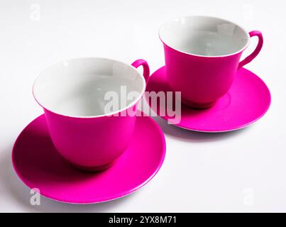 two pink ceramic Cup on white background, isolated Stock Photo