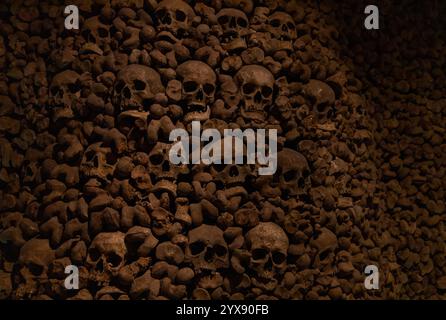 A picture of multiple skulls and bones at the Brno Ossuary. Stock Photo