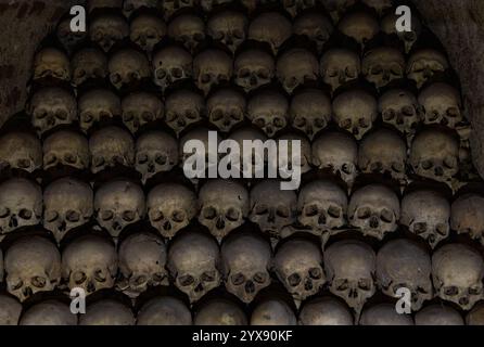 A picture of multiple skulls at the Brno Ossuary. Stock Photo