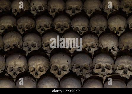 A picture of multiple skulls at the Brno Ossuary. Stock Photo