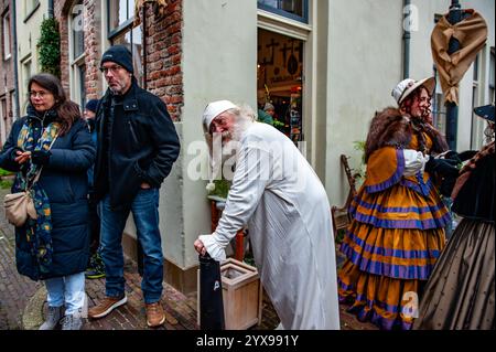 Deventer, Netherlands. 14th Dec, 2024. Each year, the 19th-century world of the English writer Charles Dickens comes to life in the city of Deventer, Netherlands, with no less than 950 characters from the famous books of Dickens on December 14, 2024. (Photo by Romy Arroyo Fernandez/NurPhoto) Credit: NurPhoto SRL/Alamy Live News Stock Photo