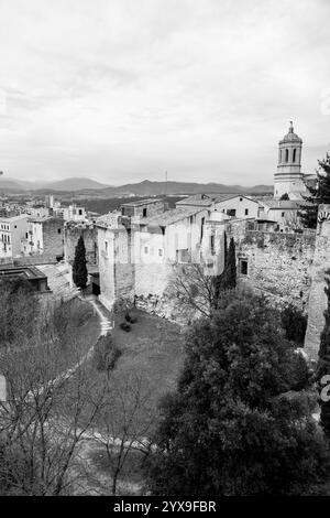 Girona, Catalonia, Spain - FEB 12, 2022: Ancient city walls of Girona, one of the most complete city walls in Europe. Stock Photo