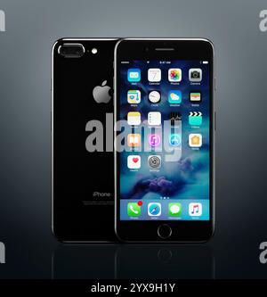 Apple iPhone 7 Plus black front and back with desktop icons on its display isolated on dark gray background Stock Photo