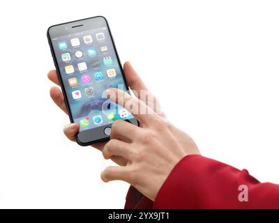Woman hand holding Apple iPhone 7 Plus and touching screen with a finger isolated on white background Stock Photo