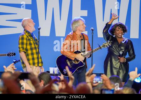 Michael Stipe, Jon Bon Jovi, and Tanya Trotter of The War and Treaty perform onstage during a Team Harris Walz campaign event at the Renaissance Atlanta Waverly Hotel on November 3, 2024 in Atlanta, Georgia, USA. (Photo by Julia Beverly/Alamy) Stock Photo