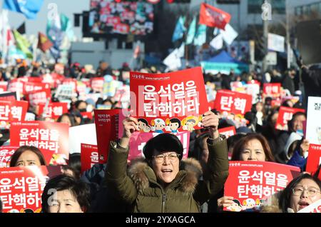 Beijing, South Korea. 14th Dec, 2024. People attend a rally calling for the impeachment of South Korea's President Yoon Suk-yeol near the National Assembly in Seoul, South Korea, Dec. 14, 2024. Credit: Yao Qilin/Xinhua/Alamy Live News Stock Photo