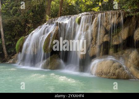 Erawan Waterfall in the rainforest in north of Kanchanaburi, Thailand Stock Photo
