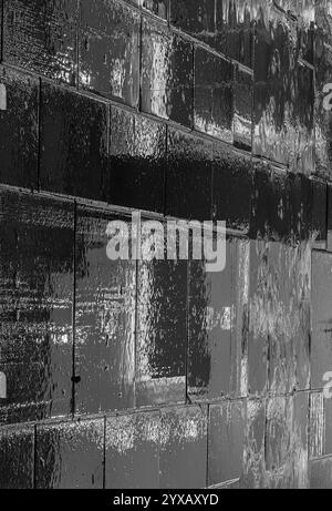 Reflective Shapes on Wet Streets During a Rainy Night Stock Photo