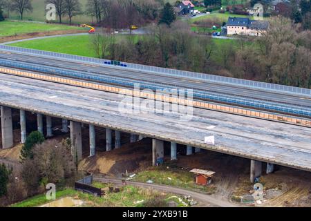 Unna, Germany. 15th Dec, 2024. Shortly before the blasting of two sections of the Liedbachtal bridge, the bridge is still intact on site (aerial photo with a drone). After a number of technical problems, two sections of the bridge on the A1 near Unna have now been blown up at the second attempt. The busy highway was therefore closed in both directions between the Dortmund/Unna junction and the Westhofen junction. Credit: Christoph Reichwein/dpa/Alamy Live News Stock Photo