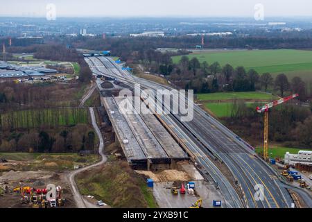 Unna, Germany. 15th Dec, 2024. Shortly before the blasting of two sections of the Liedbachtal bridge, the bridge is still intact on site (aerial photo with a drone). After a number of technical problems, two sections of the bridge on the A1 near Unna have now been blown up at the second attempt. The busy highway was therefore closed in both directions between the Dortmund/Unna junction and the Westhofen junction. Credit: Christoph Reichwein/dpa/Alamy Live News Stock Photo