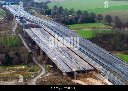 Unna, Germany. 15th Dec, 2024. Shortly before the blasting of two sections of the Liedbachtal bridge, the bridge is still intact on site (aerial photo with a drone). After a number of technical problems, two sections of the bridge on the A1 near Unna have now been blown up at the second attempt. The busy highway was therefore closed in both directions between the Dortmund/Unna junction and the Westhofen junction. Credit: Christoph Reichwein/dpa/Alamy Live News Stock Photo