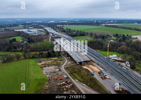 Unna, Germany. 15th Dec, 2024. Shortly before the blasting of two sections of the Liedbachtal bridge, the bridge is still intact on site (aerial photo with a drone). After a number of technical problems, two sections of the bridge on the A1 near Unna have now been blown up at the second attempt. The busy highway was therefore closed in both directions between the Dortmund/Unna junction and the Westhofen junction. Credit: Christoph Reichwein/dpa/Alamy Live News Stock Photo