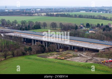 Unna, Germany. 15th Dec, 2024. Shortly before the blasting of two sections of the Liedbachtal bridge, the bridge is still intact on site (aerial photo with a drone). After a number of technical problems, two sections of the bridge on the A1 near Unna have now been blown up at the second attempt. The busy highway was therefore closed in both directions between the Dortmund/Unna junction and the Westhofen junction. Credit: Christoph Reichwein/dpa/Alamy Live News Stock Photo