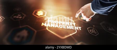 Businessman pressing PROPERTY MANAGEMENT button on virtual screens Stock Photo