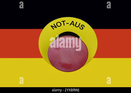 Deutschlandfahne und Not-Aus Deutschlandfahne und Not-Aus, 15.12.2024, Borkwalde, Brandenburg, Auf einer Deutschlandflagge befindet sich ein Not-Aus-Knopf. *** German flag and emergency stop German flag and emergency stop, 15 12 2024, Borkwalde, Brandenburg, There is an emergency stop button on a German flag Stock Photo