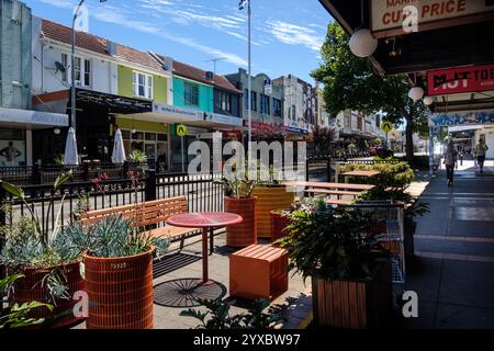Outdoor seating for a cafe and independent businesses onMarrickville Road, Marrickville, Sydney, Australia Stock Photo