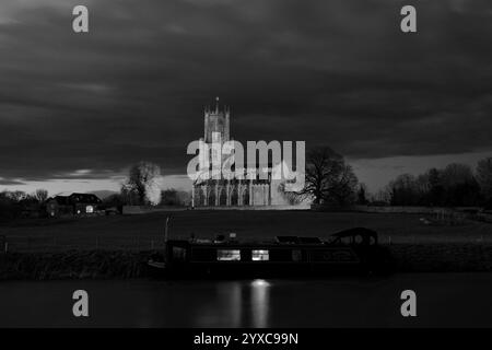 Dusk view of St Marys Church, river Nene, Fotheringhay village, Northamptonshire, England, UK Stock Photo