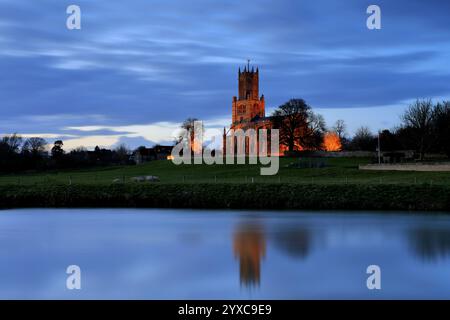 Dusk view of St Marys Church, river Nene, Fotheringhay village, Northamptonshire, England, UK Stock Photo