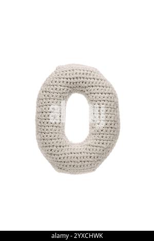 A crocheted number zero in light grey, isolated on a white background, ideal for educational materials, crafts, or decorative purposes. Stock Photo
