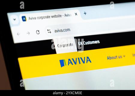 New York, USA - December 15, 2024: Aviva website homepage displayed on computer screen with company logo. Online platform for insurance, savings, and Stock Photo