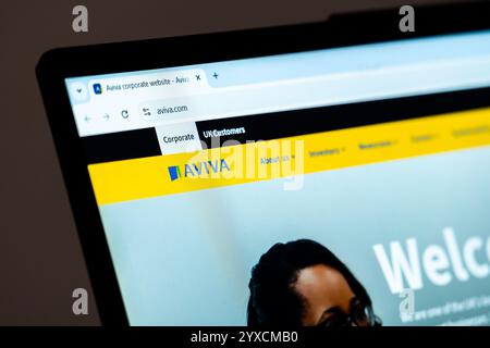 New York, USA - December 15, 2024: Aviva website homepage displayed on computer screen with company logo. Online platform for insurance, savings, and Stock Photo
