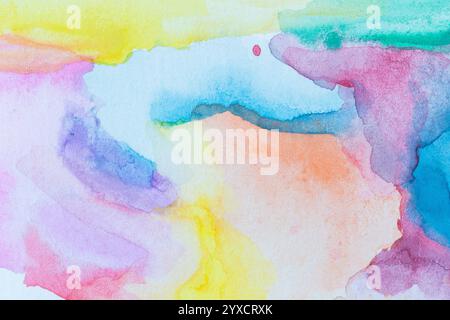 Macro close-up of an abstract colorful watercolor gradient fill background with watercolour stains. Full frame textured paper background. Copy space. Stock Photo