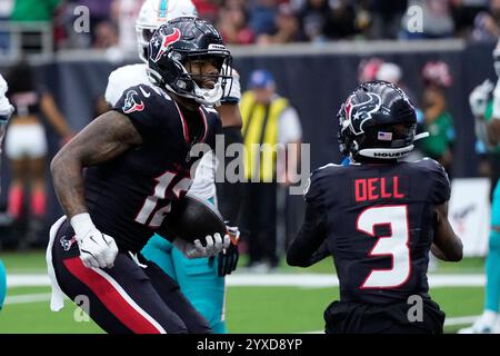 Houston, Texas on Sunday, December 15, 2024. Houston Texans wide receiver Nico Collins (12) celebrates a touchdown reception with Tank Dell (3) during the second quarter against the Miami Dolphins at NRG Stadium in Houston, Texas on Sunday, December 15, 2024. Photo by Kevin M. Cox/UPI Credit: UPI/Alamy Live News Stock Photo