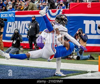 Baltimore Ravens cornerback Nate Wiggins celebrates afte intercepting a