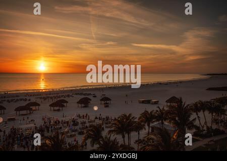 Sunset (or sundown) with a boat at Marco Island, Gulf of Mexico, Florida Stock Photo