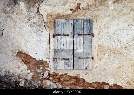 Old house with stones wall cracking Stock Photo